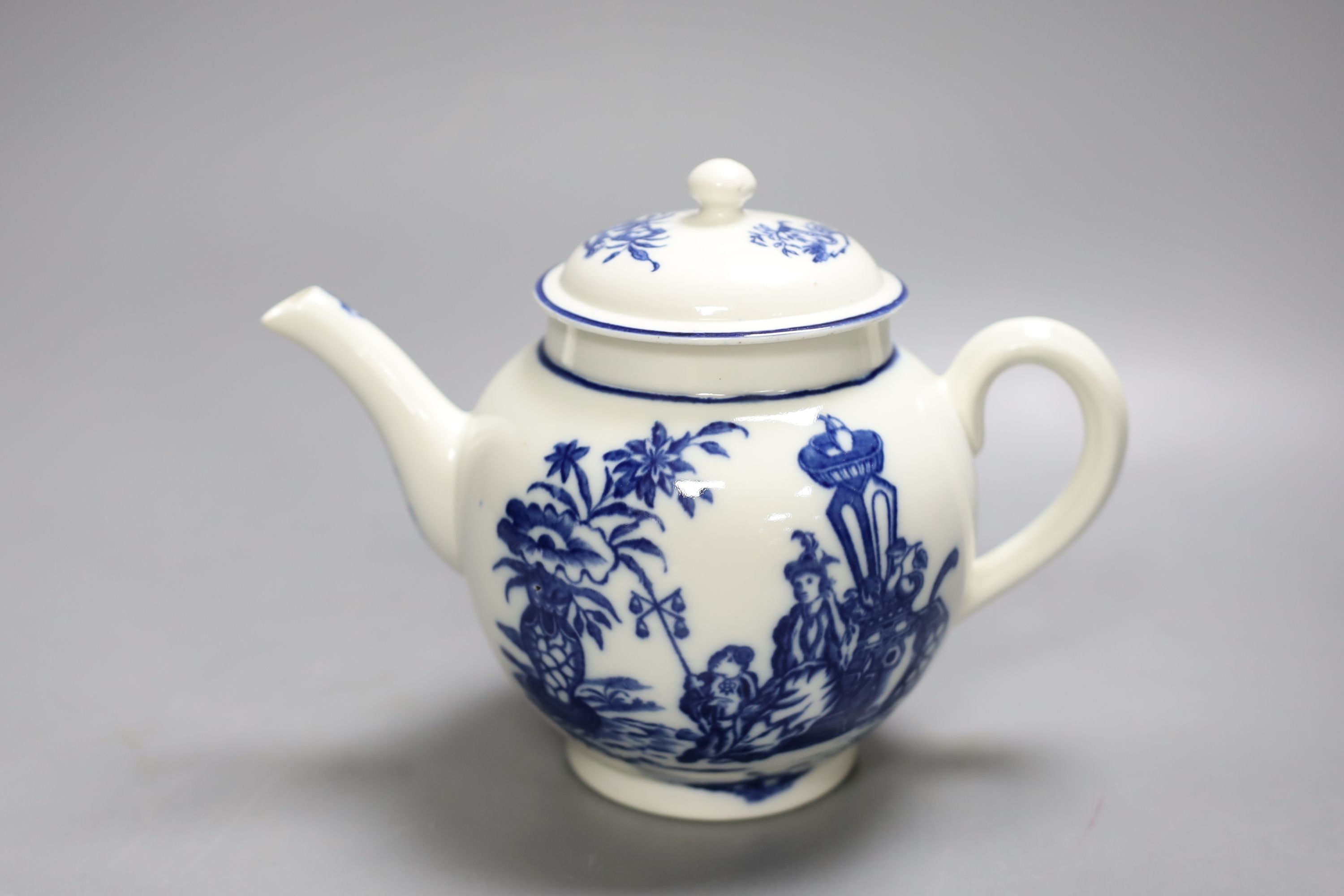 A good Caughley teapot and cover unusually having the same Bell Toy pattern on each side, c.1785, 14.5 cm high